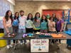 East Islip High School’s french club recently raised over $600 at its
9th annual tie-dye bake sale campaign for the She’s The First Foundation.