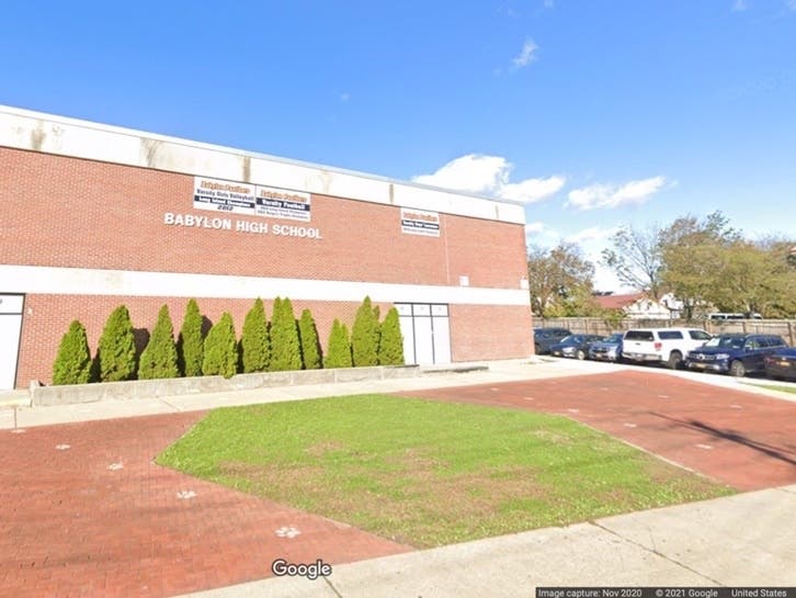 A Babylon teacher who was escorted out of the classroom in October is eligible to receive pension, according to a separation agreement with the Babylon School District.