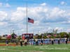 Opening day of the 2021 football season with flags flying proudly.