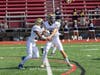 Baldwin QB Zach Kirshner hands to Anthony Byron