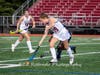 Senior Emma Sutcliffe carries the ball.