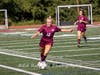 Lauren Hohenberger drives the ball upfield.