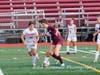 Catherine Hayes beats the defender.