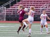 Senior Alivia Gordon challenges for the ball in the air.
