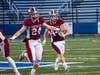 Robert Votruba (44) follows the block of Matthew Kephart (24) for good yardage.