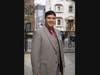 Outside his home in Long Island City, Queens N.Y., Miguel Pelaez reflects on the hope of God's Kingdom to help with his fight against cancer. 