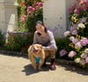 Hannah with her adopted dog, Professor. 