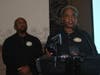 Dr. Debbie Lassiter, CEO and co-founder of Convergence Resource Center, said it is important for every woman to hear every man speak out against human trafficking. Behind her is Arnold Cifax, chairman of the HEMAD campaign. 