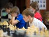 Youth learning chess 