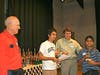 Awards ceremony after the tournament at St Matthews Chess Tournament 2010
(Left to Right) Henry Eickelberg, Rishi Sethi, GM Shulman handing out awards