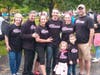 Robb Tadelman and family wearing the breast cancer awareness t-shirts.