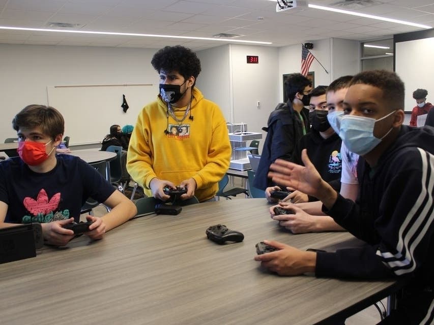 Students at Evergreen Park Community High School take part in video gaming during an informational meeting on E-sports, the newest activity offered at the school.