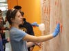 Student Abby Rech works on the crime scene portion of the STEAM activity.
