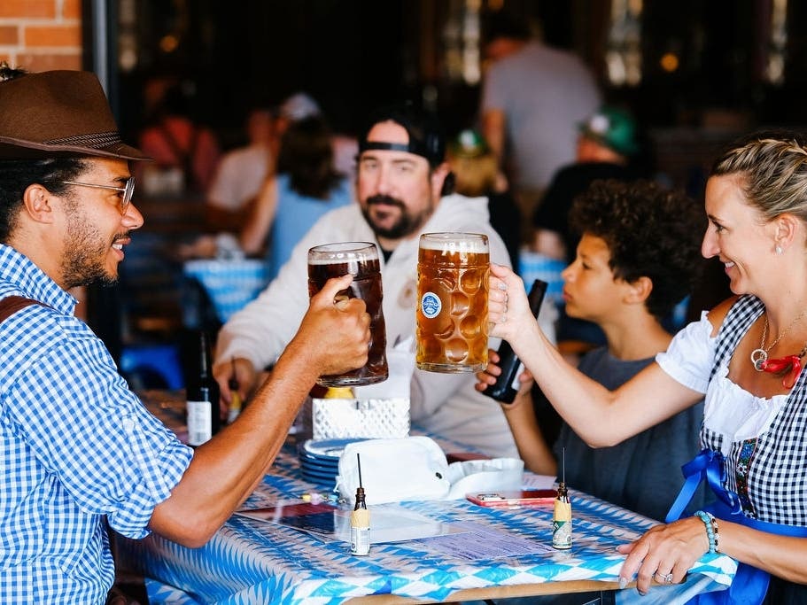 Guests raise a stein at Double Clutch Brewing Company’s annual Clutchtober Fest in Evanston.