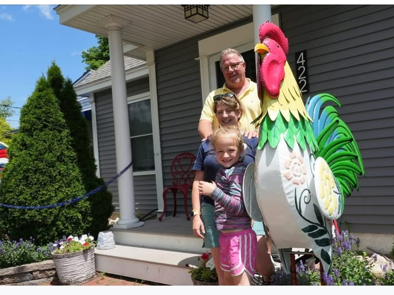 Sara and Dave LeBlanc, their daughter Pyper and Mister Rooster