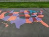 James Gannon stenciled and painted a new United States map at Eli Whitney Elementary School as part of his Eagle Scout project. 