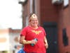 Silk City Fit member Danielle Anderson crosses the finish line