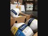 Pictured: Donated turkeys from Foster Farms in a food bank warehouse. The company is donating enough turkey to feed 80,000 people in need from San Diego to Seattle this Thanksgiving.