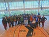 Law enforcement officers from City of Fort Lauderdale Police, Broward Sheriff’s Office and teen campers pose for a group photo