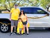 Paul Cardone, pediatric cancer survivor Lorenzo and Briana Cardone decorate their car in support of pediatric patients.