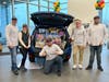 Subaru Ambassadors (J. Mykel Hill, Christine Hill, Matt Yazumbek, Eddie Groberski, Robert Barton) with one of the two filled Foresters.