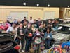 Subies of the Corn Members with Toys Getting Prepared for Distribution at Toys for Tots