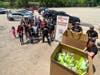 Subies of the Corn members deliver food to Northern Illinois Food Bank