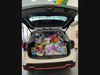 2024 Subaru Forester Sport with it's Impressive Amount of Toys Collected During the Event
