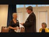 Dorie Hightower, Council Aid to Vice President Evan Glass (Montgomery County Council) presented a certificate to Eric Gruber, Principal, Cadence Living.