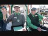 Residents (from left) Steve Metric and John Olson ride the Smith Crossing float in the Tinley Park Irish Parade.