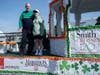 Ray Marneris, Smith Senior Living CFO rides the Smith Crossing float with his grandson.