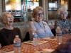 Pat Padula, Char Baloun and Bea Slattery enjoy Michael Portillo's stories about life in the restaurant business.