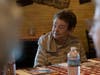 Smith Crossing resident Sharon Cooper is intrigued by the stories behind "Out of the Dog House."