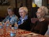 Paula Fitzmaurice, Mary Flynn, Pat Padula enjoy the presentation.