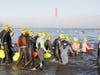 Swimmers enter the water at last year's Swim Across America San Francisco open water swim. This year's swim will take place Saturday, September 24, at Little Marina Green in San Francisco.