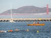 Swimmers have a nice view of the Golden Gate Bridge during the annual Swim Across America San Francisco open water swim.