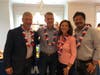 Rob and Julie Colligan, center, with Swim Across America founder Matt Vossler (left) and Olympic swimmer Craig Beardsley (right) at a recent Swim Across America meet-and-greet event they held at their home in Old Greenwich.