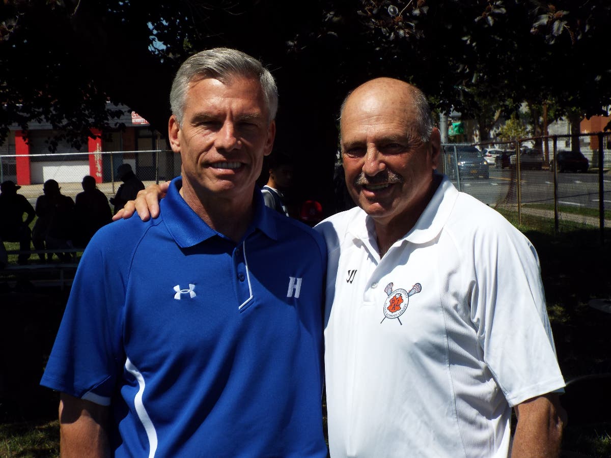 Hempstead PAL Lacrosse program benafactor James C. Metzger, left, and Coach Al Hodish.