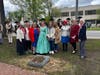 Members of the Polly Cooper Chapter stand with the DAR America 250! Marker