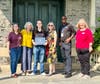 Members of the Hudson River Museum Staff flank Rowan as he receives the award from the DAR