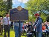 Mrs. Judith Moshier Taylor, a direct descendant of John Patterson, helps unveil the marker