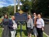 Polly Cooper members surround new marker honoring John Patterson 