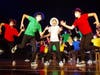 Wellesley Theatre Project performing "Sit Down You're Rockin' the Boat" from Guys and Dolls JR on the main stage during the festival's New Works Showcase 