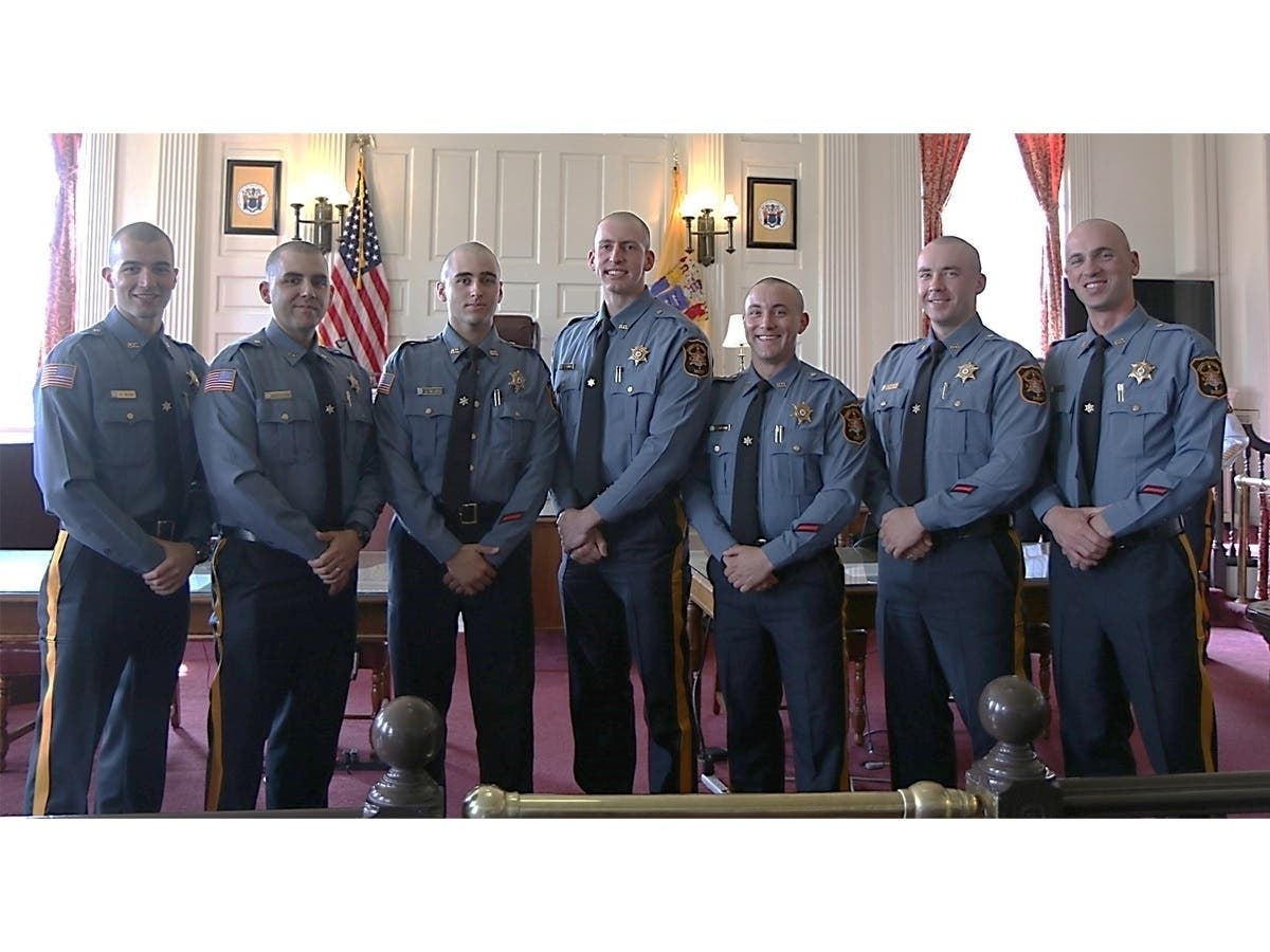 The new officers were sworn in during an official ceremony presided over by Sheriff James M. Gannon.