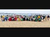 All of the 2022 Shamrock Splash participants gathered together for a photo before jumping into the clean water at Constitution beach. 