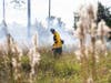 A firefighter conducts a prescribed burn at the UF/IFAS Ordway-Swisher Biological Station in Melrose. 