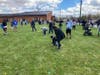 Parents and children participate in one of the three special-needs friendly egg hunts that took place at the Burlington County Spring Fun Fest. 
