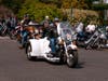 Some of the Blessing of the Bikes attendees riding on their bikes. 