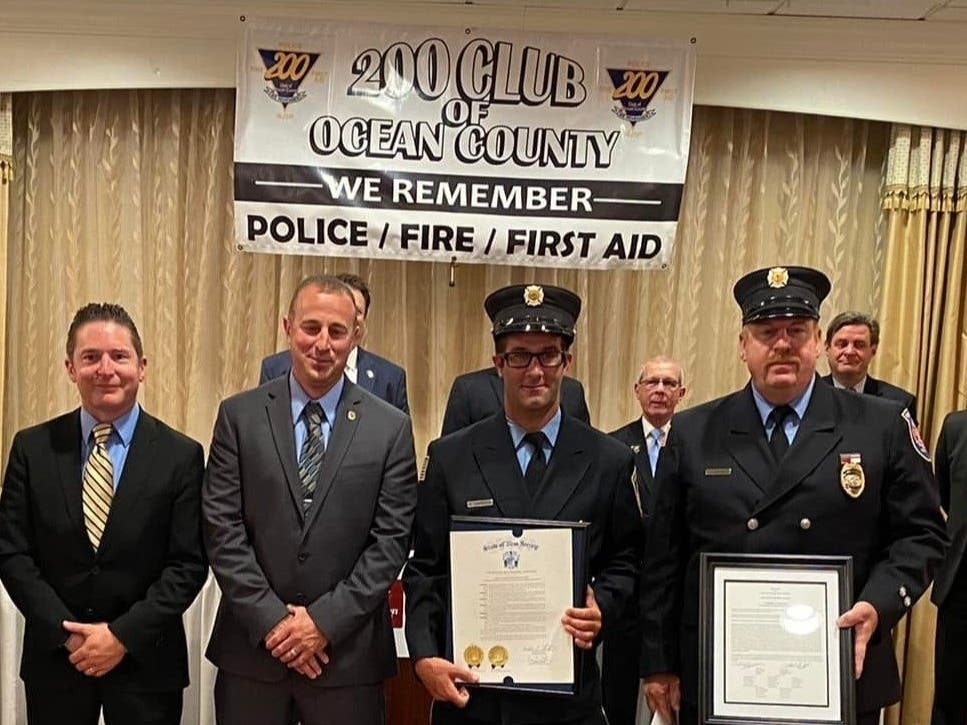 Officer Noah Schaffer, Officer Alan Abrecht, Firefighter Scott Smedile and Firefighter Jerry Hayes during the 200 Club presentation. 