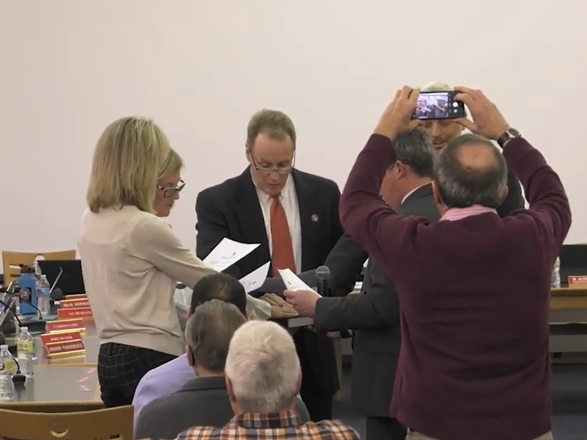 The new board members were sworn in.